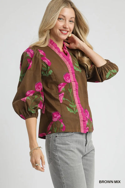 Lightweight 100% cotton floral blouse with split V-neck, ruffle trim, puff sleeves, and straight silhouette