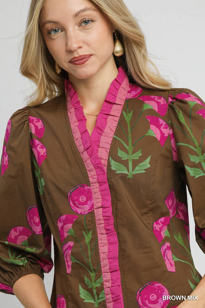 Lightweight 100% cotton floral blouse with split V-neck, ruffle trim, puff sleeves, and straight silhouette