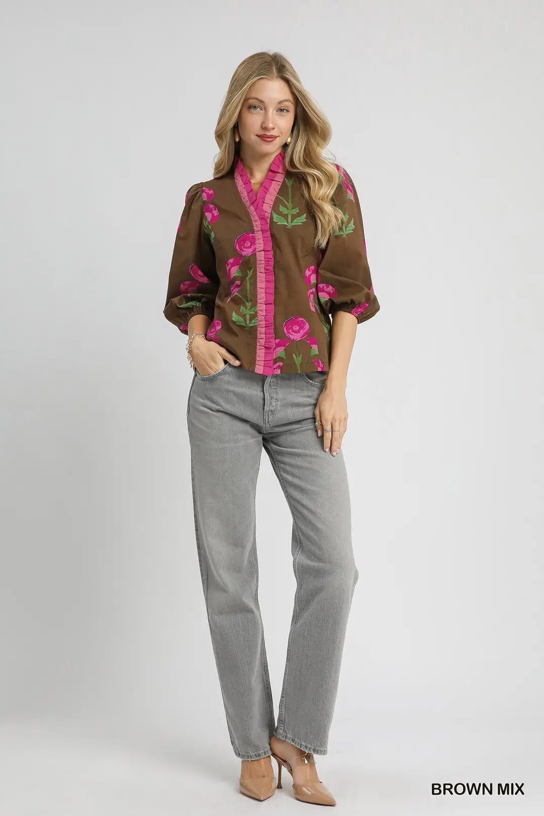 Lightweight 100% cotton floral blouse with split V-neck, ruffle trim, puff sleeves, and straight silhouette