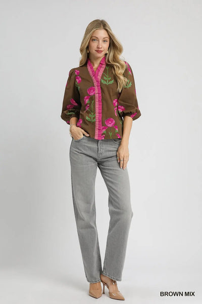 Lightweight 100% cotton floral blouse with split V-neck, ruffle trim, puff sleeves, and straight silhouette