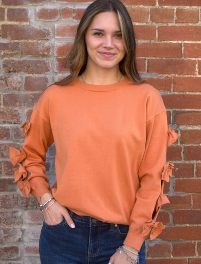 Bow Embellished Crew Neck Sweater-Bow Detail,Bow Embellished,Burnt Orange,clothing,Crew Neck,Drop Shoulder,Knit Sweater,Knit Top,Ribbed Crew Neck,Ribbed Hem,Ribbed Neckline,Sweater,Sweaters,Top,Tops,Women,women's-[option4]-[option5]-[option6]-Bella Bliss Boutique in Texas