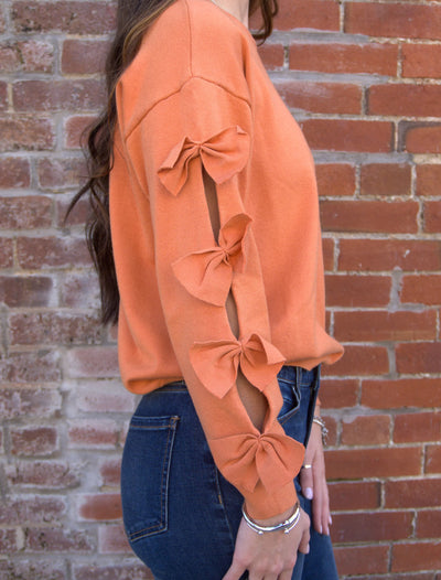 Bow Embellished Crew Neck Sweater-Bow Detail,Bow Embellished,Burnt Orange,clothing,Crew Neck,Drop Shoulder,Knit Sweater,Knit Top,Ribbed Crew Neck,Ribbed Hem,Ribbed Neckline,Sweater,Sweaters,Top,Tops,Women,women's-[option4]-[option5]-[option6]-Bella Bliss Boutique in Texas