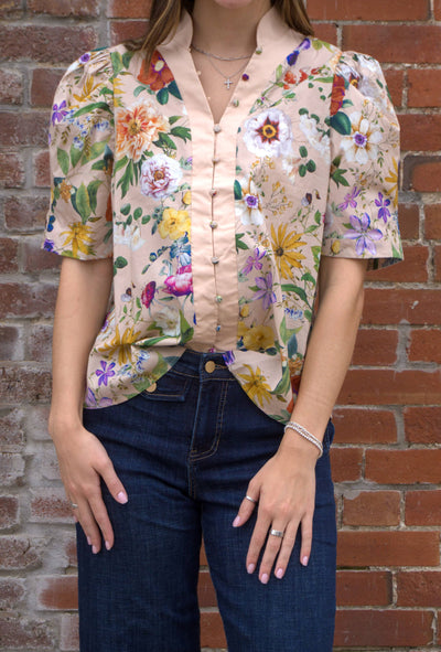 Women’s floral puff sleeve top with contrast button-trimmed band collar, button-front closure, and lightweight semi-sheer fabric