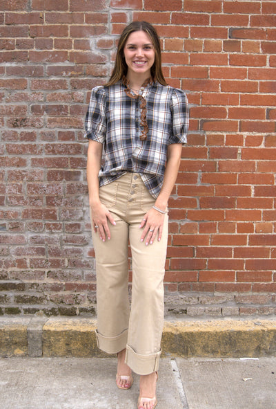 Women’s plaid puff sleeve top with button-front closure and contrast ruffle trim