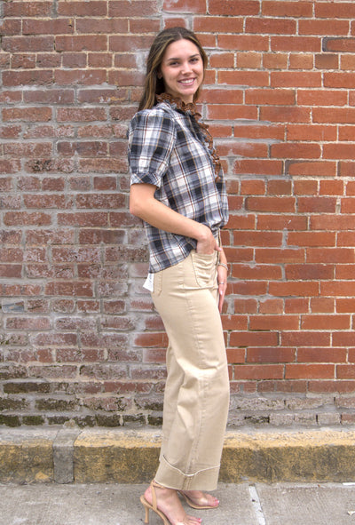 Women’s plaid puff sleeve top with button-front closure and contrast ruffle trim