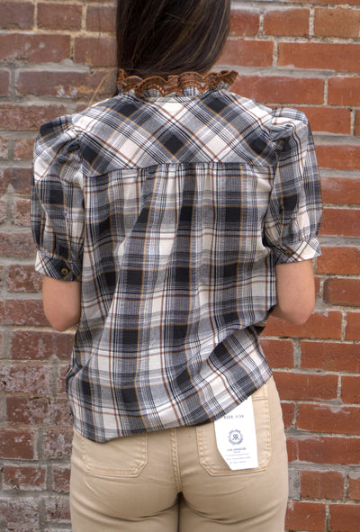 Women’s plaid puff sleeve top with button-front closure and contrast ruffle trim