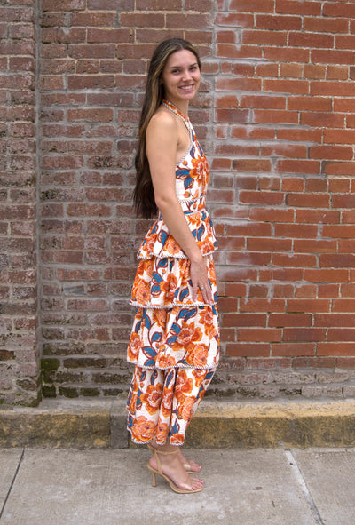 Women’s floral halter midi dress with bow tie neckline, contrast binding, smocked back, and tiered skirt