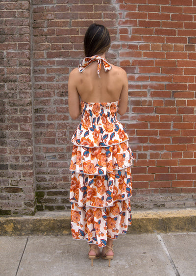 Women’s floral halter midi dress with bow tie neckline, contrast binding, smocked back, and tiered skirt