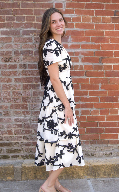 Floral Embroidered Tiered Dress-Black/Ivory,clothing,dresses,embroidered,Embroidered Detail,Floral,Floral Embroidery,Floral Print,Midi Dress,Tiered,Tiered Dress,women's-[option4]-[option5]-[option6]-Bella Bliss Boutique in Texas