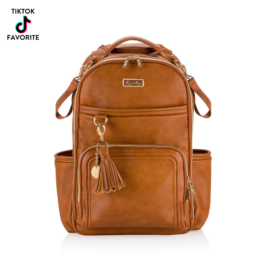 Itzy Ritzy Cognac Boss Plus™ Backpack Diaper Bag-Backpack,Children & Tweens,children's,children's Accessories,Children/Tween,Childrens/Tween,Diaper Bag,Diaper Bags,Diapers Bag,Faux Leather,Infant to 6,Itzy Ritzy,Leather-[option4]-[option5]-[option6]-Bella Bliss Boutique in Texas