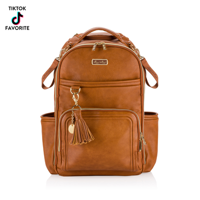 Itzy Ritzy Cognac Boss Plus™ Backpack Diaper Bag-Backpack,Children & Tweens,children's,children's Accessories,Children/Tween,Childrens/Tween,Diaper Bag,Diaper Bags,Diapers Bag,Faux Leather,Infant to 6,Itzy Ritzy,Leather-[option4]-[option5]-[option6]-Bella Bliss Boutique in Texas